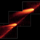 Infrared image from NASA’s Spitzer Space Telescope showing the busted Comet 73P/Schwassman-Wachmann 3 skimming along a trail of debris left during its multiple trips around the Sun. “The flame-like objects are the comet’s fragments and their tails, while the dusty comet trail is the line bridging the fragments,” according to NASA.